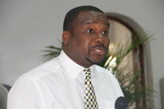 Permanent Secretary in the Ministry of Social Development Keith Glasgow delivering remark at the opening ceremony of the Department of Youth and Sports Summer Job Attachment Programme at the St. Paul’s Anglican Church Hall on June 29, 2015